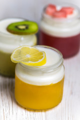 homemade jelly made from natural juices of orange, watermelon and kiwi, milk