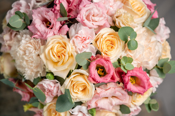 Close up Beautiful bouquet of mixed flowers. the work of the florist at a flower shop. Fresh cut flower.