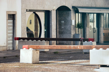 Anti terrorism car barriers. Roadblock made of concrete blocks and iron bars to protect the pedestrians