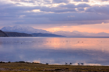 Dawn of the sun, early morning on Lake Manasarovar.