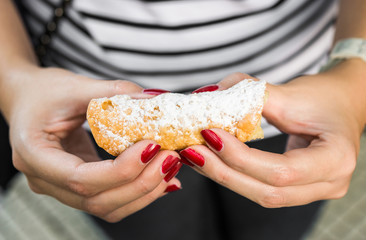 Close up of cannoli, a traditional Italian crunchy pastry with cream inside
