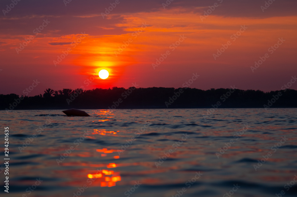 Wall mural red sunset urban river landscape.