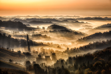 Foggy sunrise at the south styrian wine road
