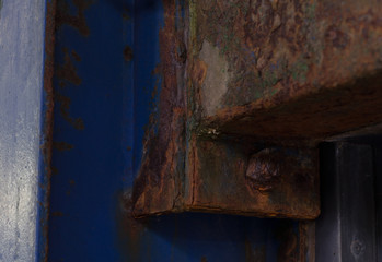 rusty channel and beam bolted