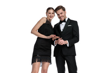 Happy couple smiling and posing together w