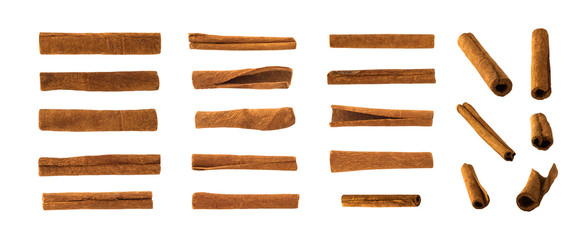 Set of cinnamon sticks isolated on white background. Aromatic condiment