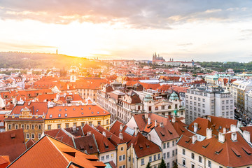 Fototapeta premium Evening sunset in Prague. Prague Castle illuminated by sun flare, Czech Republic