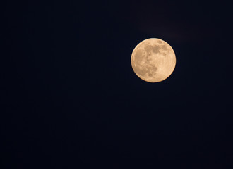 Full moon in the night black sky