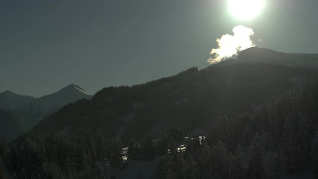 flight over serfaus mountain forest in the austrian alps