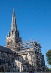 Fototapeta na wymiar Chichester Cathedral with scaffolding in place during restoration to the roof.