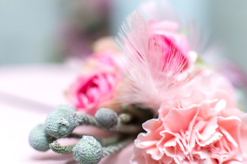 Wedding decorations. Decoration of holidays with fresh flowers. Pink roses and carnations.