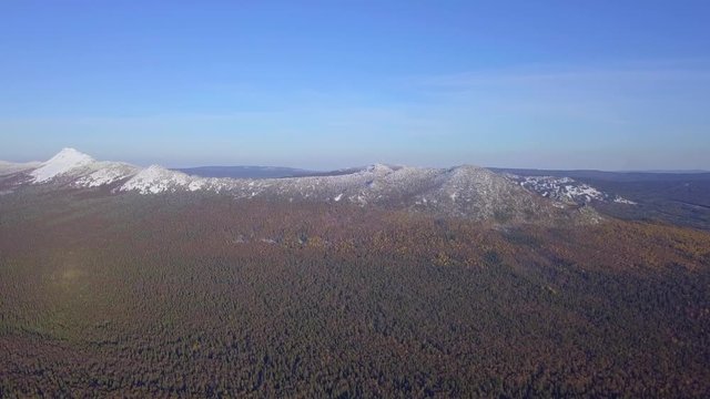 Taganay Mountain Ridge Peak Covered with Snow. Winter in Taganay National Park in the Urals, Russia. Aerial View