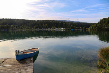 Fototapeta na wymiar Fisherman boats on Lake Walchensee, Bavaria, Germany