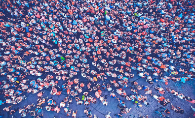 Aerial. People crowd background. Top view. Toned image.
