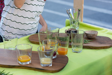 Delicious organic juices served at outdoor market place.
