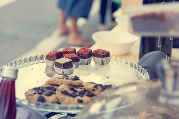 Delicious finger food deserts sold at outdoor market place.