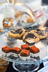 Delicious finger food deserts sold at outdoor market place.