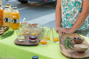 Delicious organic juices served at outdoor market place.