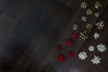 wrapping Christmas bows on floor for message festive time abstract