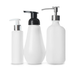 Bottles of cosmetics on white background