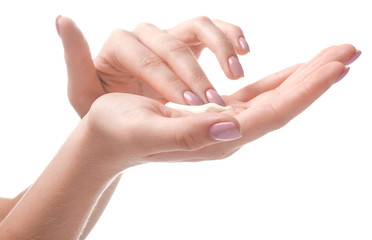 Female hands with cream on white background