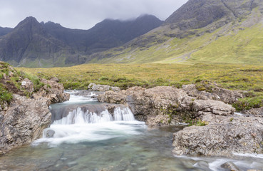 Fairy pools waterfalls with Black Cullins as a background