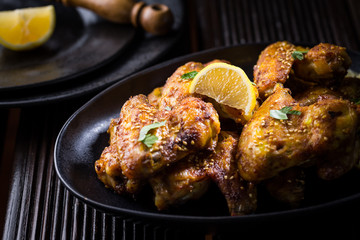 Spicy chicken wings with garlic and lemon marinade