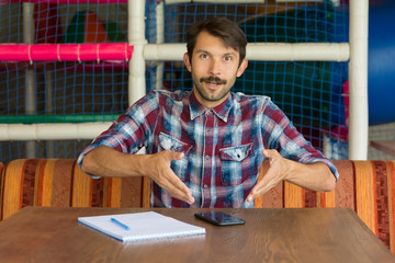 young man greatly surprised by information from the Internet	