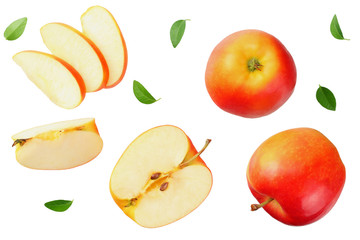 red apples with slices and green leaves isolated on a white background. top view