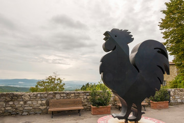 Castellina in Chianti, Italy - September 19, 2018: Black rooster, the emblem of Chianti Classico...