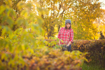 Autumn mood. Girl in the autumn park