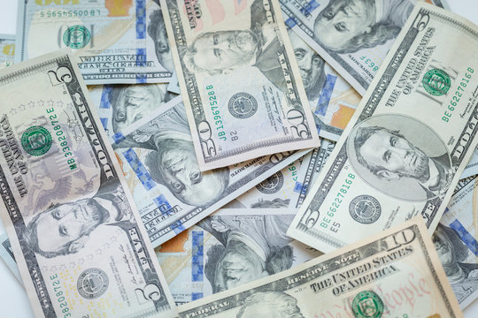 close up view of cash money dollars bills in amount