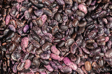 Heap of red beans for background texture, close-up, top view, copy space for text
