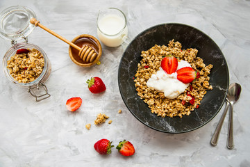 Muesli bowl with yogurt and  strawberries