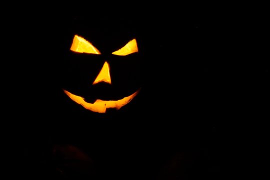 The lantern of Jack - a symbol of the celebration of Halloween - glows in the dark.