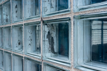 Wall composed of faded glass tiles