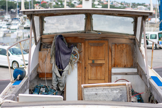 Old boat with wooden decorations and doors