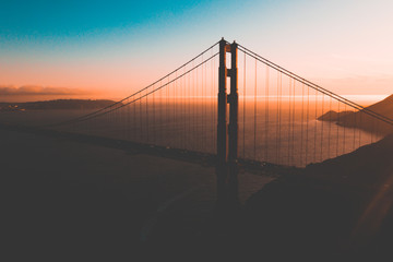Aerial sunset view of the Golden Gate Bridge from Battery Spencer, Golden Gate National Recreation...