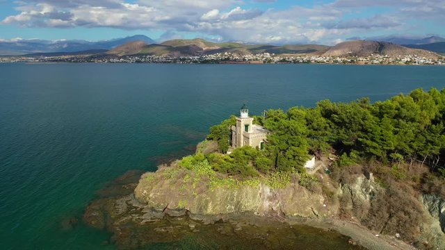 Aerial drone video of famous lighthouse built in small island in town of Halkida, Evoia island, Greece