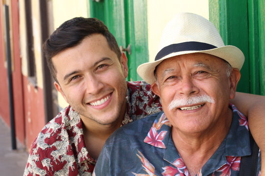 Hispanic Senior Man With His Son