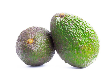 GREEN AVOCADO ON WHITE BACKGROUND