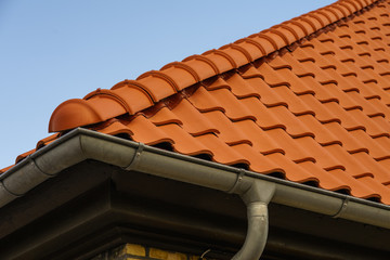 Corner of the house with gutter