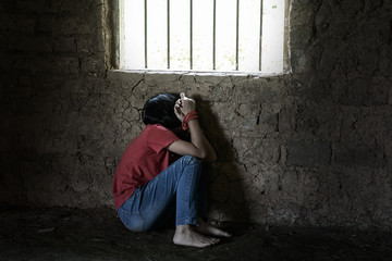Human tied with rope.Abused and tortured concept. Human trafficking concept.Stop abusing violence.