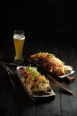 Glass of cold beer with appetizer. catering menu