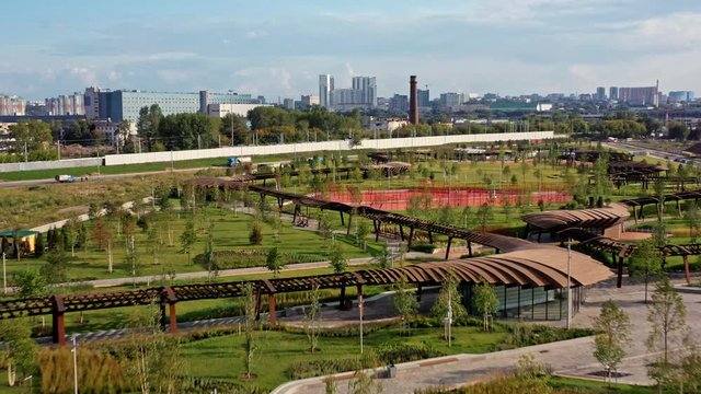Picturesque drone aerial zoom in view of Park Tiufielieva Roshcha in Moscow, Russia. Park ZILART in the south of Moscow