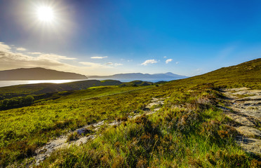 Beautiful scenic landscape of Scotland nature with beautiful evening sun set sky.
