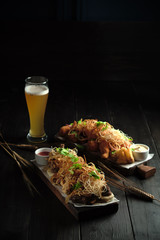 Glass of cold beer with appetizer. catering menu