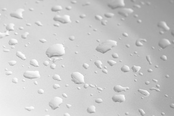 Fototapeta na wymiar water drops on gray background