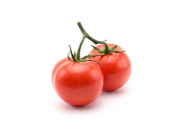 Red tomatoes on white background