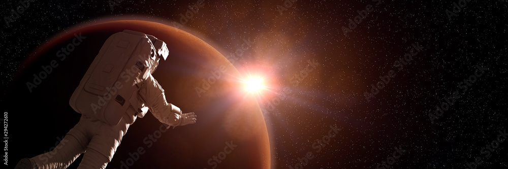 Canvas Prints astronaut watching the sunrise during a space walk in orbit of planet mars
